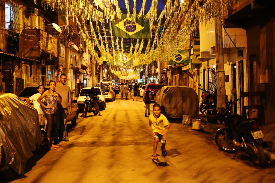 Young kids skateboard in the street