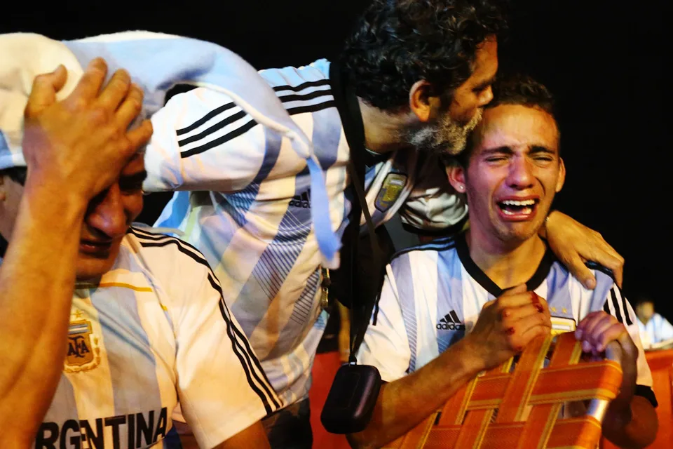 Supporters of all ages collapse in tears
